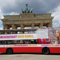 Bus campaign in front of the Brandenburg Gate